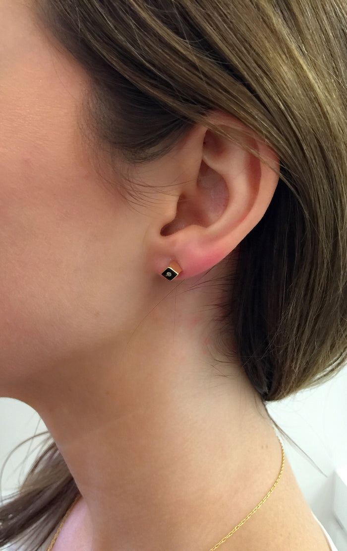 Opposition Stud Earrings
