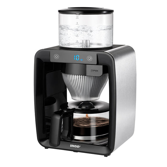 Der Unold Kaffeeautomat Aroma Star ist eine moderne elektrische Kaffeemaschine mit Digitalanzeige, Glaswassertank oben, Glaskanne darunter und einem Gehäuse aus schwarzem Edelstahl, abgebildet beim Kaffeekochen.