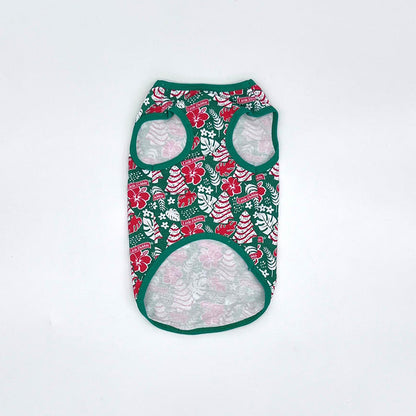 Back-view of Little Debbie Hawaiian Dog shirt showcasing the green Little Debbie Hawaiian pattern, highlighted by red and white designs of Little Debbie Christmas Tree Cakes, Little Debbie Red Ribbon Logos, and an aloha leaf and flower motif.
