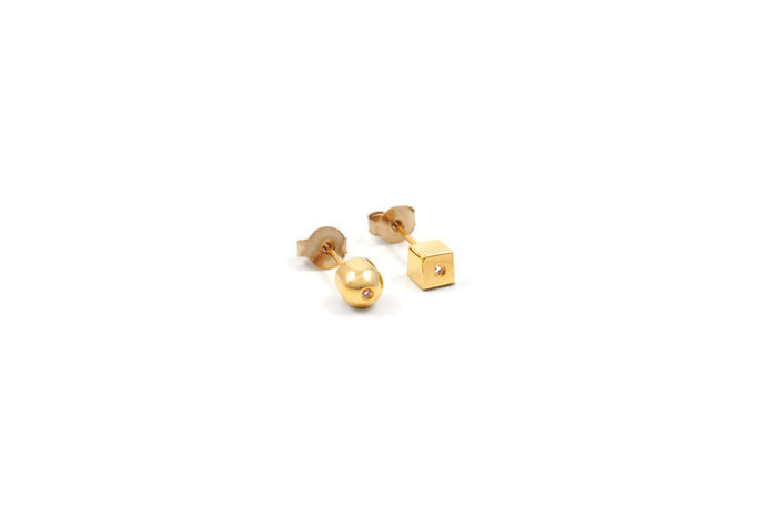 Opposition Stud Earrings