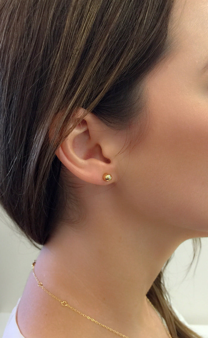 Opposition Stud Earrings