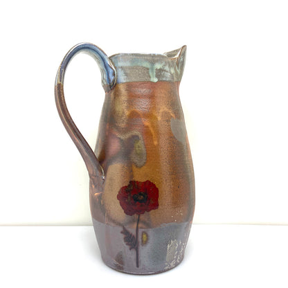 Pitcher with poppies