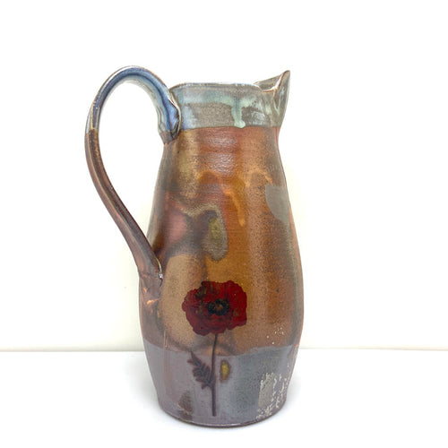 Pitcher with poppies